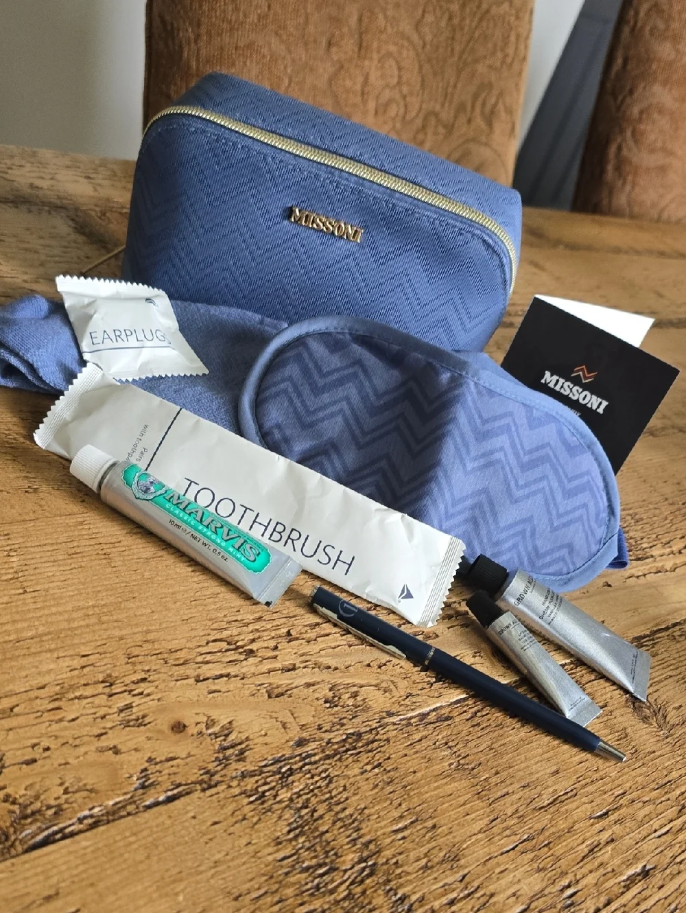 Missoni Blue Chevron Pouch with Gold Accents, Filled With Travel Essentials.